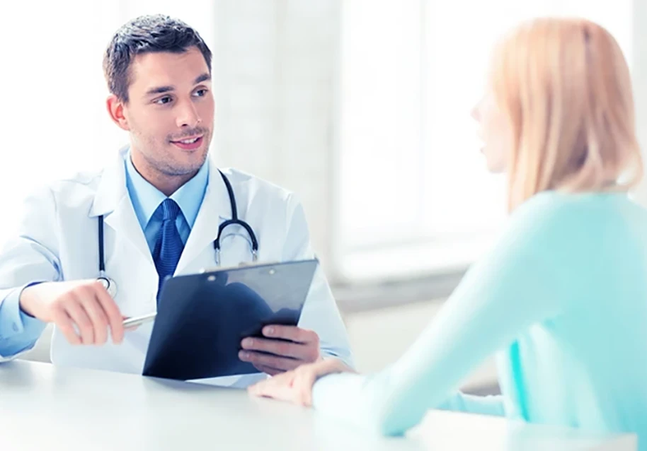 A doctor discussing with a patient during a consultation.