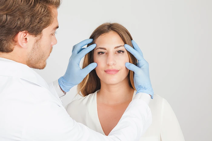 Woman Getting a Consultation for Cheek Implants