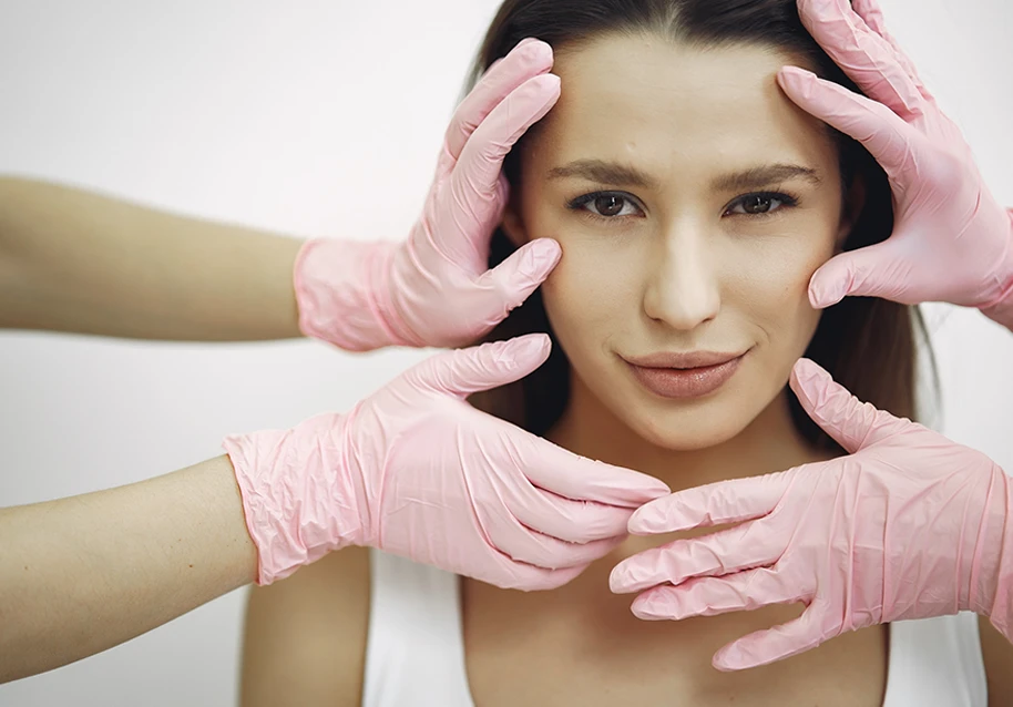 A woman getting her face inspected for a facelift