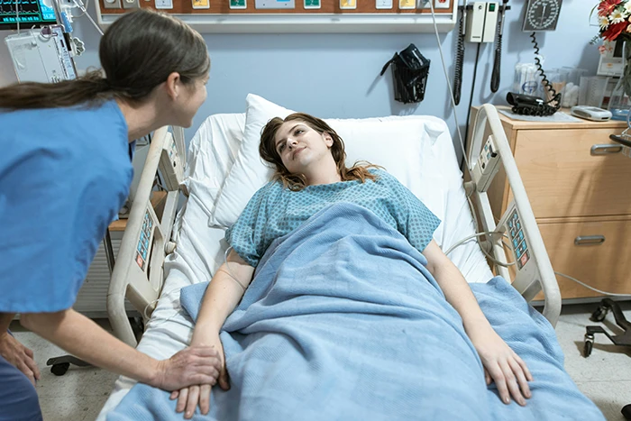 A female patient after surgery with a doctor 