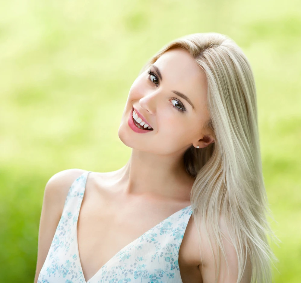 Smiling woman with refined facial profile